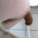 A woman is recorded through a hole in the wall of a public restroom stall wall as she takes a nice shit. Presented in 720P format. Over 3 minutes.
